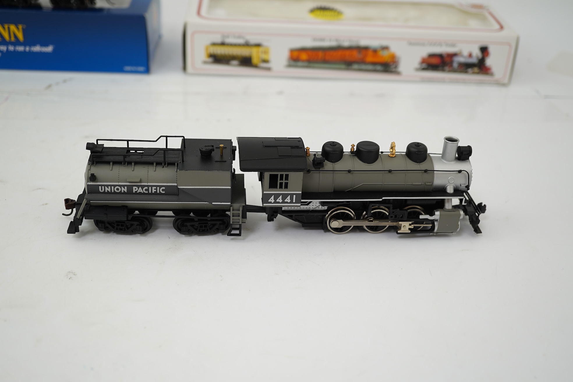 Three boxed HO gauge Bachmann Union Pacific locomotives; (51705) model of ALCO, 41, 2-6-0 locomotive with bogie tender, together with (51501) model of Prairie, 1836, 2-6-2 locomotive with bogie tender, and (50701) model